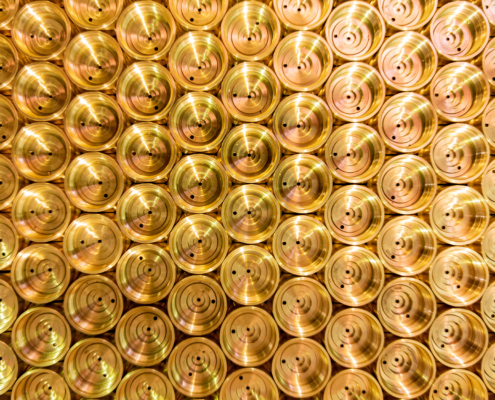 Top Down View, Abstract Flat Industrial Close Up Background Of Shiny Brass Metal Threaded Hexagonal Fitting Part