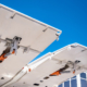 Aircraft Wing Flaps Detail Against Bright Blue Sky