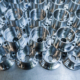 A Batch Of Shiny Aluminium Aerospace Parts Made With Cnc Machine
