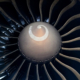 High Angle Close Up Of Commercial Aircraft Engine Turbine Fan Blades